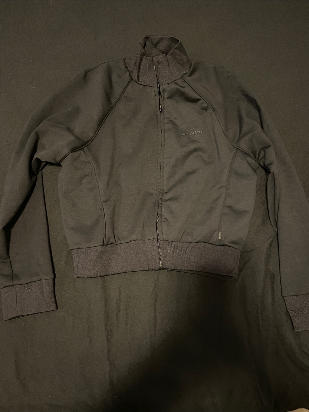 Black Nike Skims track jacket